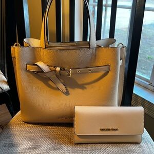 Michael Kors purse and matching wallet.